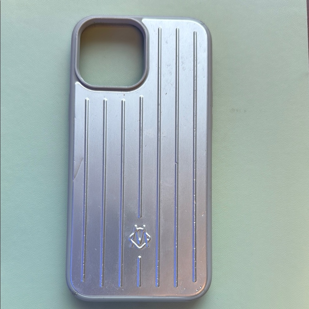 RIMOWA Silver iPhone Case with Ribbed Texture and Heart Emblem
